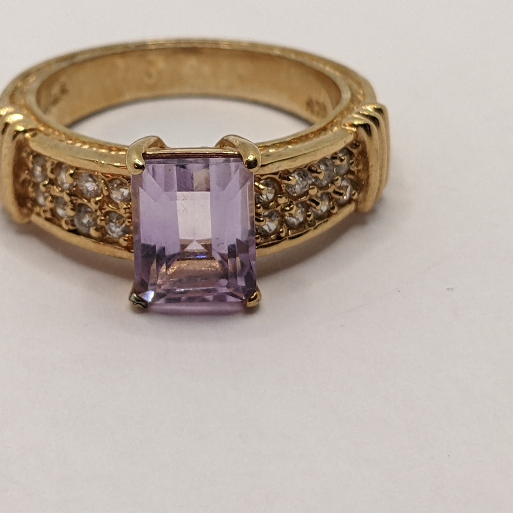Purple stone gold tone ring. Make offer.
